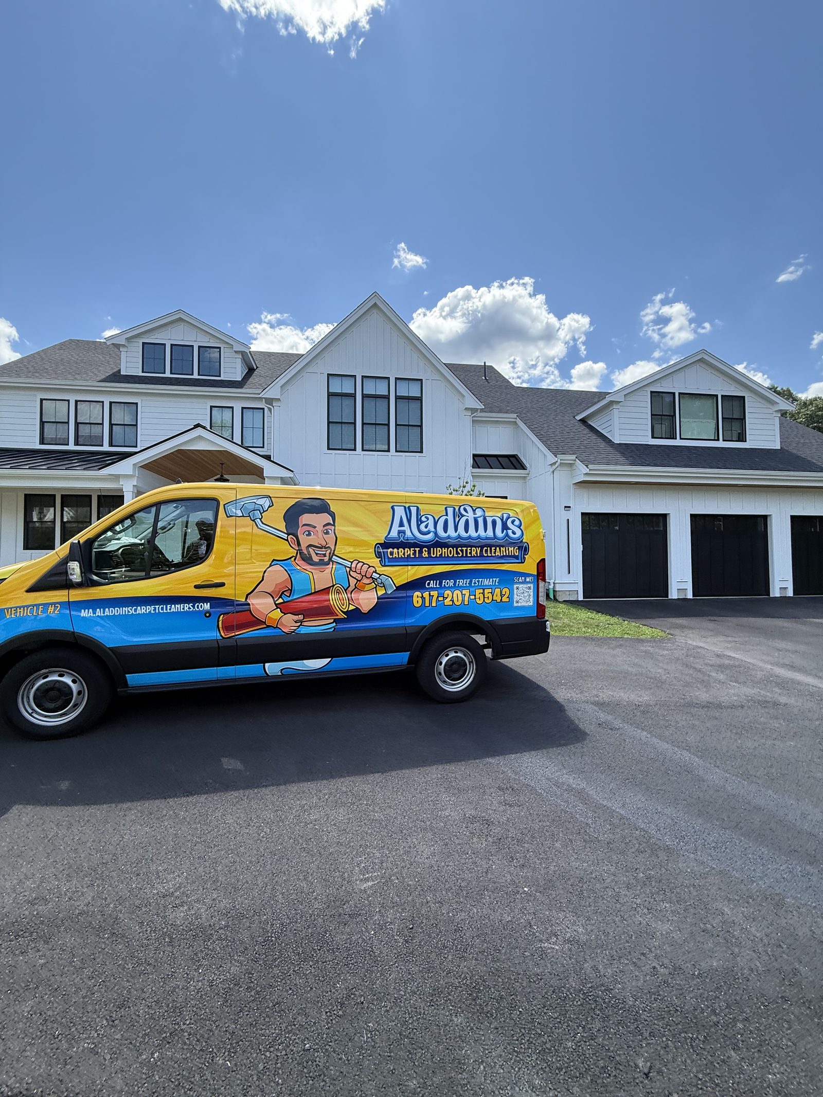 Aladdin's Carpet and Upholstery Cleaning branded service van at a customer's home